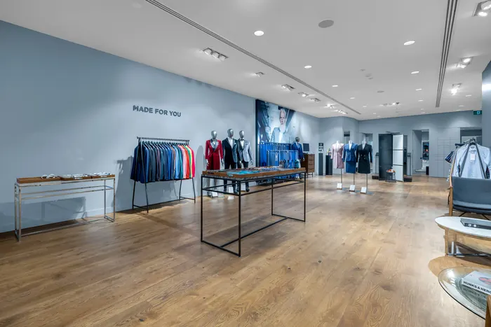 Millwork, fixtures and finishes at Indochino, Square One, Mississauga, Ontario