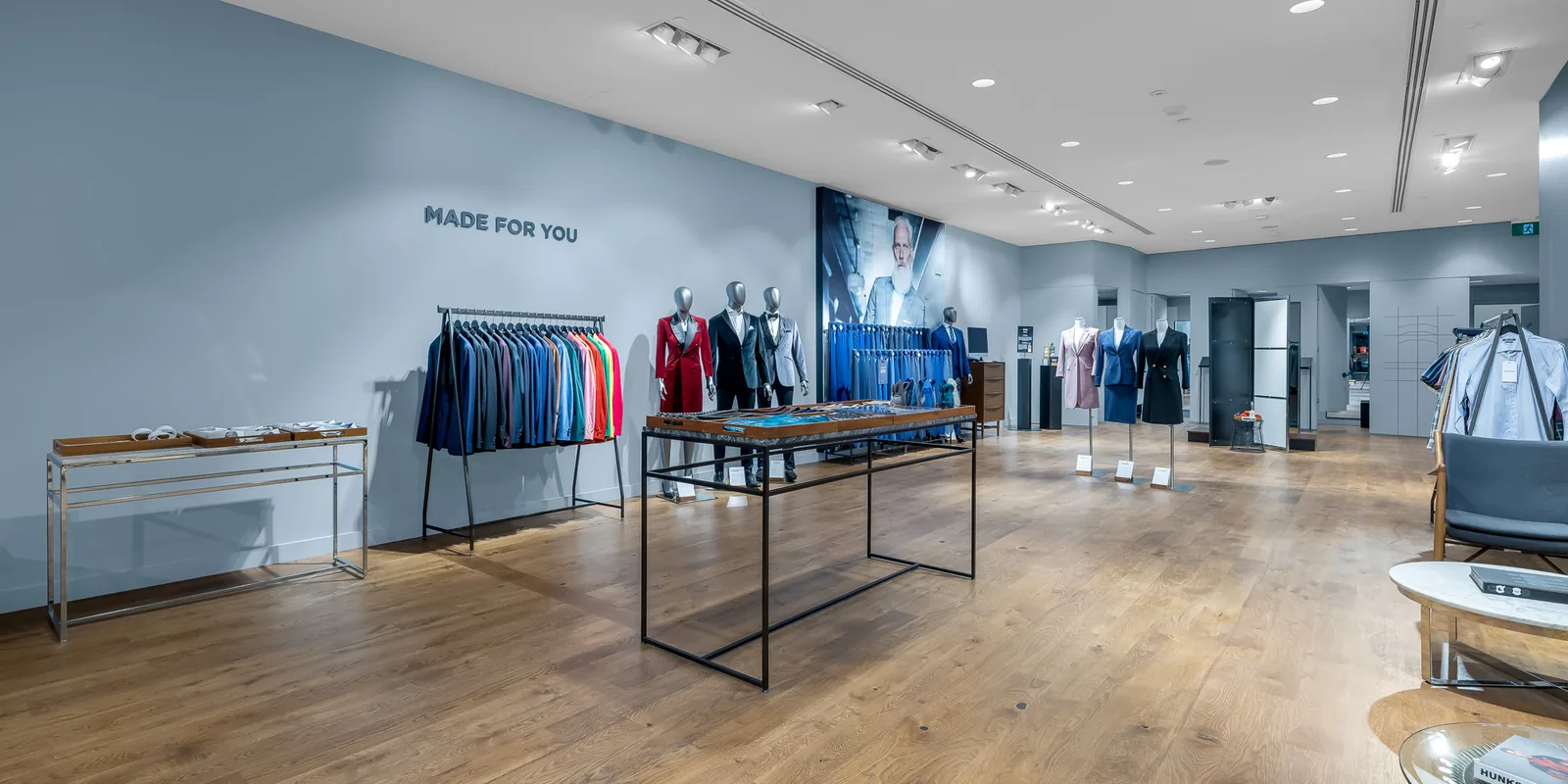 Completed Indochino retail fit-out at Square One Shopping Centre, Mississauga, Ontario