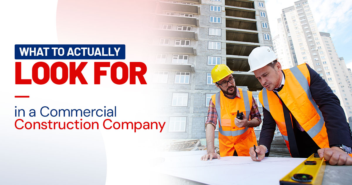 Engineers evaluating blueprints for a commercial construction project in Canada.