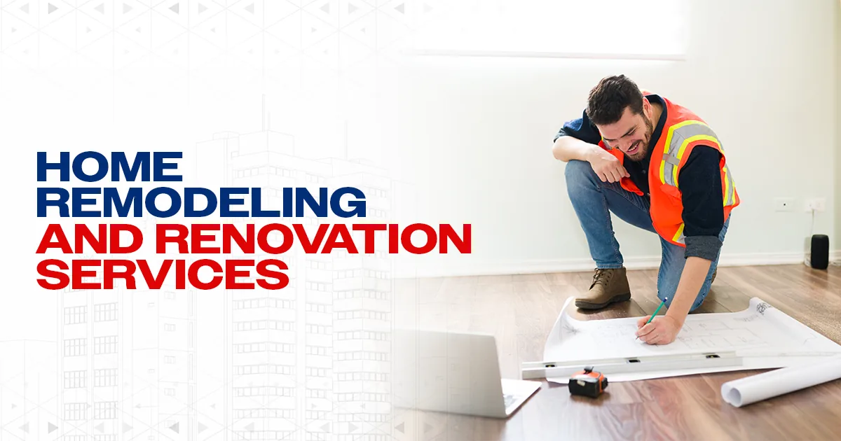 Contractor kneeling on a hardwood floor in an empty room, marking up drawings beside a laptop and tape measure