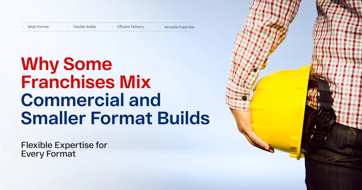 A person in a checked shirt holding a yellow hard hat at their side